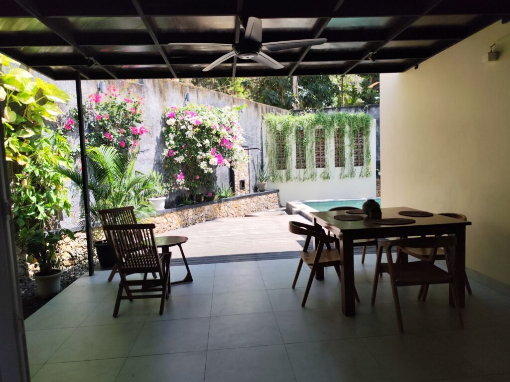 Sakuta Villa at Kalandra Estate, Kuta, Central Lombok – luxury villa with private pool, modern bedrooms, spacious living area, and tropical terrace near Kuta Beach Lombok. Sakuta Villa at Kalandra Estate, luxury villa with private pool in Kuta, Central Lombok Modern bedroom interior at Sakuta Villa Kuta Lombok with tropical ambiance Private swimming pool at Sakuta Villa near Kuta Beach Lombok Spacious living room with tropical garden view at Sakuta Villa Lombok Stylish tropical terrace at Sakuta Villa Kalandra Estate, Central Lombok Luxury villa accommodation in Kuta Lombok – Sakuta Villa private pool view Modern tropical design villa at Kalandra Estate, Kuta, Central Lombok Comfortable bedroom with pool view at Sakuta Villa Kuta Lombok Exotic tropical garden surrounding Sakuta Villa in Central Lombok Romantic sunset view from Sakuta Villa terrace in Kuta Lombok Honeymoon villa with private pool at Kalandra Estate Kuta Lombok Family-friendly luxury villa near Kuta Beach Lombok – Sakuta Villa Open living space with natural light at Sakuta Villa Central Lombok Modern bathroom with tropical design at Sakuta Villa Lombok Aerial view of Sakuta Villa Kalandra Estate near Kuta Beach Lombok, shanti yoga lombok, kuta lombok, villa kuta lombok