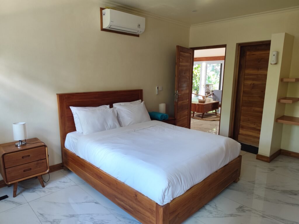 Sakuta Villa at Kalandra Estate, Kuta, Central Lombok – luxury villa with private pool, modern bedrooms, spacious living area, and tropical terrace near Kuta Beach Lombok. Sakuta Villa at Kalandra Estate, luxury villa with private pool in Kuta, Central Lombok Modern bedroom interior at Sakuta Villa Kuta Lombok with tropical ambiance Private swimming pool at Sakuta Villa near Kuta Beach Lombok Spacious living room with tropical garden view at Sakuta Villa Lombok Stylish tropical terrace at Sakuta Villa Kalandra Estate, Central Lombok Luxury villa accommodation in Kuta Lombok – Sakuta Villa private pool view Modern tropical design villa at Kalandra Estate, Kuta, Central Lombok Comfortable bedroom with pool view at Sakuta Villa Kuta Lombok Exotic tropical garden surrounding Sakuta Villa in Central Lombok Romantic sunset view from Sakuta Villa terrace in Kuta Lombok Honeymoon villa with private pool at Kalandra Estate Kuta Lombok Family-friendly luxury villa near Kuta Beach Lombok – Sakuta Villa Open living space with natural light at Sakuta Villa Central Lombok Modern bathroom with tropical design at Sakuta Villa Lombok Aerial view of Sakuta Villa Kalandra Estate near Kuta Beach Lombok, shanti yoga lombok, kuta lombok, villa kuta lombok