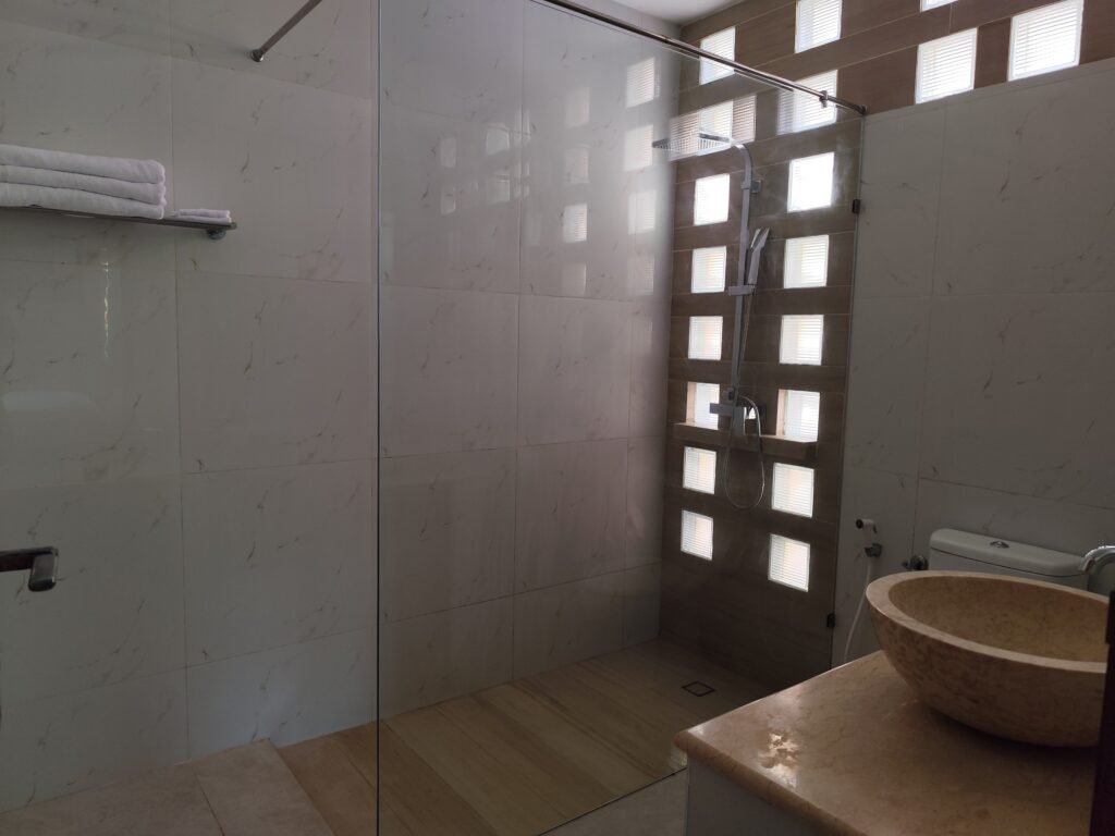 Sakuta Villa at Kalandra Estate, Kuta, Central Lombok – luxury villa with private pool, modern bedrooms, spacious living area, and tropical terrace near Kuta Beach Lombok. Sakuta Villa at Kalandra Estate, luxury villa with private pool in Kuta, Central Lombok Modern bedroom interior at Sakuta Villa Kuta Lombok with tropical ambiance Private swimming pool at Sakuta Villa near Kuta Beach Lombok Spacious living room with tropical garden view at Sakuta Villa Lombok Stylish tropical terrace at Sakuta Villa Kalandra Estate, Central Lombok Luxury villa accommodation in Kuta Lombok – Sakuta Villa private pool view Modern tropical design villa at Kalandra Estate, Kuta, Central Lombok Comfortable bedroom with pool view at Sakuta Villa Kuta Lombok Exotic tropical garden surrounding Sakuta Villa in Central Lombok Romantic sunset view from Sakuta Villa terrace in Kuta Lombok Honeymoon villa with private pool at Kalandra Estate Kuta Lombok Family-friendly luxury villa near Kuta Beach Lombok – Sakuta Villa Open living space with natural light at Sakuta Villa Central Lombok Modern bathroom with tropical design at Sakuta Villa Lombok Aerial view of Sakuta Villa Kalandra Estate near Kuta Beach Lombok, shanti yoga lombok, kuta lombok, villa kuta lombok