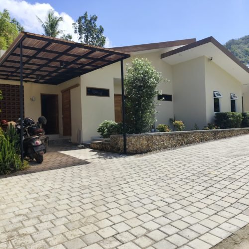 Sakuta Villa at Kalandra Estate, Kuta, Central Lombok – luxury villa with private pool, modern bedrooms, spacious living area, and tropical terrace near Kuta Beach Lombok. Sakuta Villa at Kalandra Estate, luxury villa with private pool in Kuta, Central Lombok Modern bedroom interior at Sakuta Villa Kuta Lombok with tropical ambiance Private swimming pool at Sakuta Villa near Kuta Beach Lombok Spacious living room with tropical garden view at Sakuta Villa Lombok Stylish tropical terrace at Sakuta Villa Kalandra Estate, Central Lombok Luxury villa accommodation in Kuta Lombok – Sakuta Villa private pool view Modern tropical design villa at Kalandra Estate, Kuta, Central Lombok Comfortable bedroom with pool view at Sakuta Villa Kuta Lombok Exotic tropical garden surrounding Sakuta Villa in Central Lombok Romantic sunset view from Sakuta Villa terrace in Kuta Lombok Honeymoon villa with private pool at Kalandra Estate Kuta Lombok Family-friendly luxury villa near Kuta Beach Lombok – Sakuta Villa Open living space with natural light at Sakuta Villa Central Lombok Modern bathroom with tropical design at Sakuta Villa Lombok Aerial view of Sakuta Villa Kalandra Estate near Kuta Beach Lombok, shanti yoga lombok, kuta lombok, villa kuta lombok